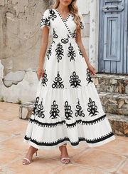 PRETTYGARDEN Womens 2025 Summer Casual V Neck Boho Maxi Dress Flowy Aline Bell Sleeve Tiered Floral Dresses with Pocket (Floral Apricot Black,X-Large)