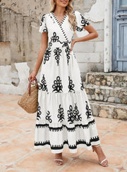 PRETTYGARDEN Womens 2025 Summer Casual V Neck Boho Maxi Dress Flowy Aline Bell Sleeve Tiered Floral Dresses with Pocket (Floral Apricot Black,X-Large)